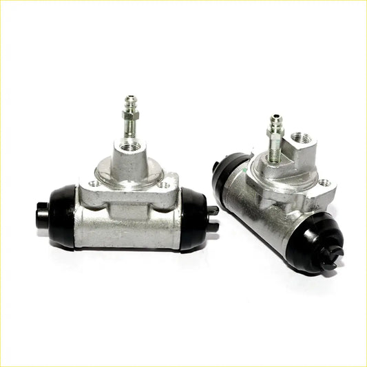 Silver and black metallic 13/16 rear wheel brake cylinder for nissan caravan urvan homy e24 1986-1997 shown from back side