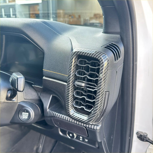 Carbon fiber interior front side vent overlay trim cover for ford with sleek black textured weave pattern