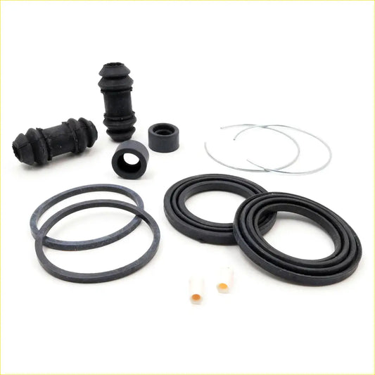 Black rubber gaskets and metal rings in a disc brake seal kit for mazda b2000 b2200 b2600 b3000 1985-1998