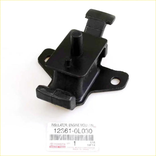 Black plastic engine mount insulator with central cylindrical protrusion and tabs for Toyota Hilux KUN16 KUN36 2008-2015