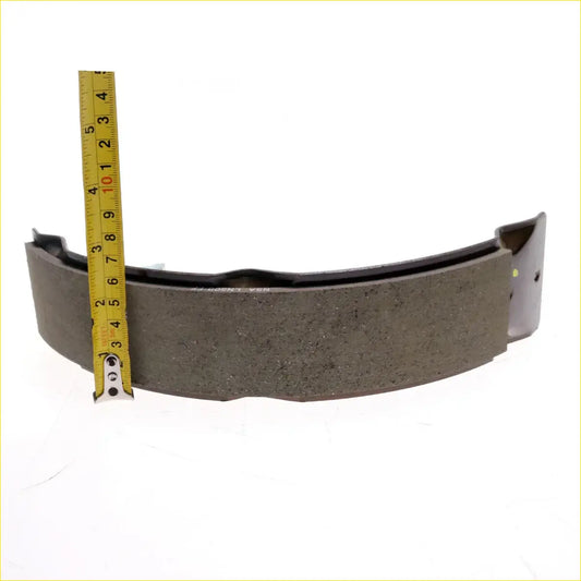 Front disc brake shoe kit for toyota hilux2wd 2008 dark gray textured with metal backing and curved shape