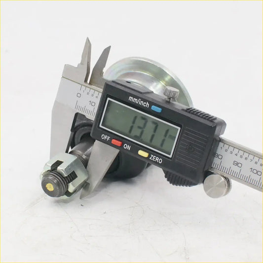 Front upper ball joint for toyota hilux 2004-2016 metallic cylinder with threaded end and brass cap measured by caliper