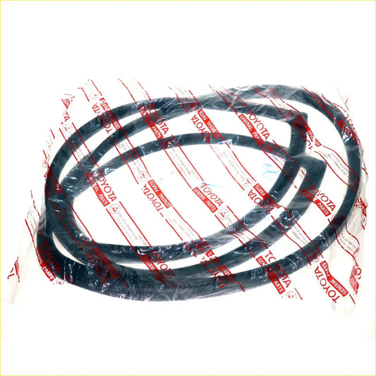 Black rubber front windscreen gasket for toyota hilux 1983-1988 wrapped in clear plastic with red toyota branding