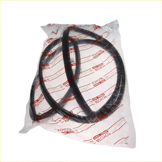 Black rubber front windshield weatherstrip seal in toyota original parts packaging for hilux 1978-1983