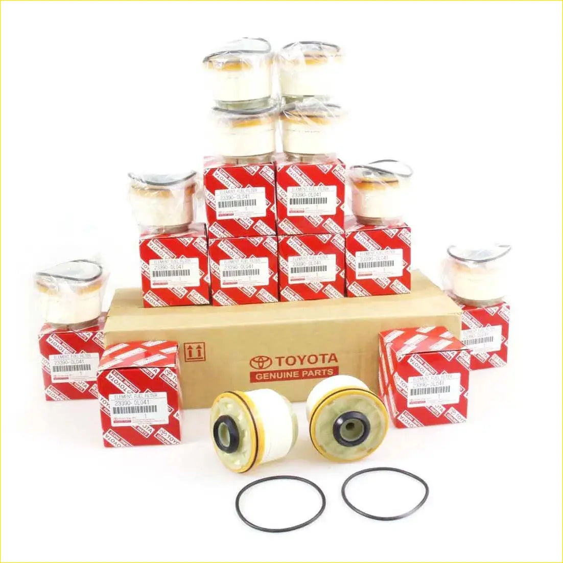 Fuel filter for toyota hilux 2004-2016 with genuine toyota oil filters in red and white packaging with black rubber seals