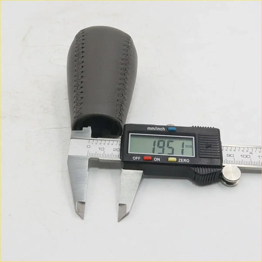 Black leather shift knob with stitched detailing for toyota hilux vigo awd rwd 2004-2010 shown from back side