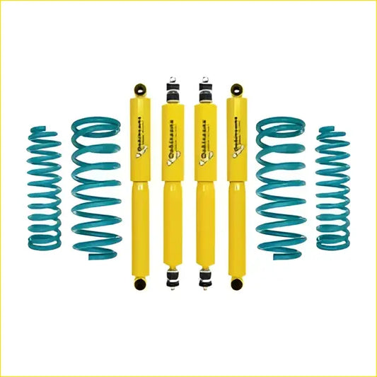 Set of four bright yellow Dobinsons twin tube Nitro shock absorbers with teal springs for Nissan Patrol Y60 GQ Wagon