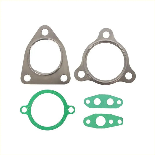 Set of four metallic and green turbo charger gaskets with varied shapes for toyota hilux landcruiser engines