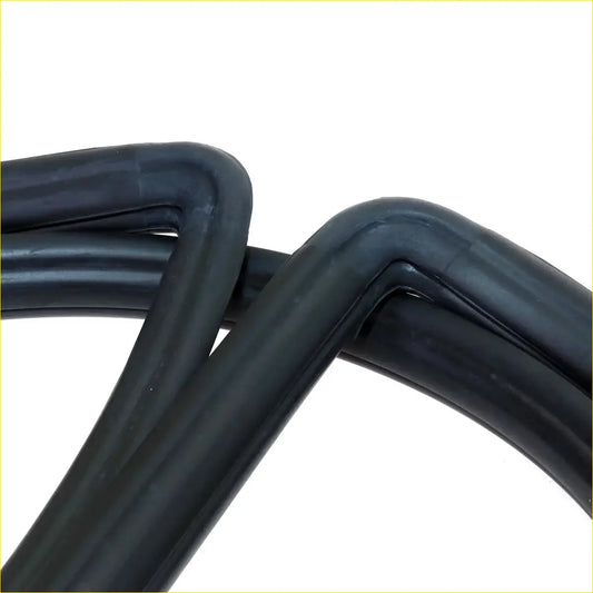 Black rubber rear windscreen gasket for Toyota Hilux 1983-1998 with smooth rounded edges and glossy finish