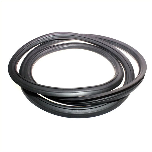 Black rubber gasket coiled in a circular stack for rear windscreen weatherstrip of Mazda B1600 B1800 REPU FD Courier