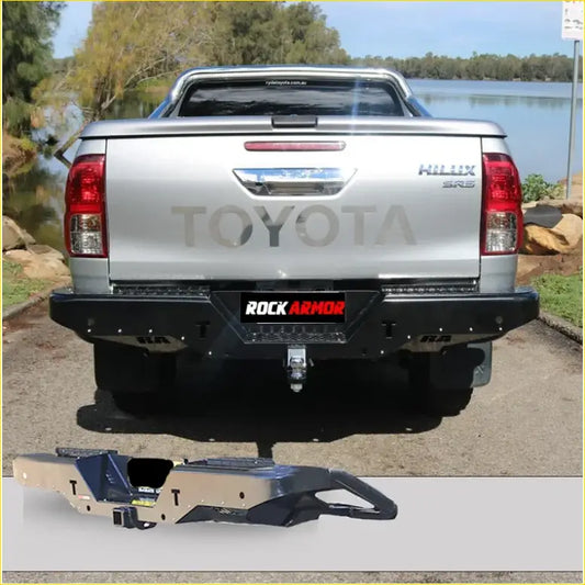Back view of silver Toyota Hilux SR5 with black steel Rockarmor rear step and towbar for Hilux N80 2015+