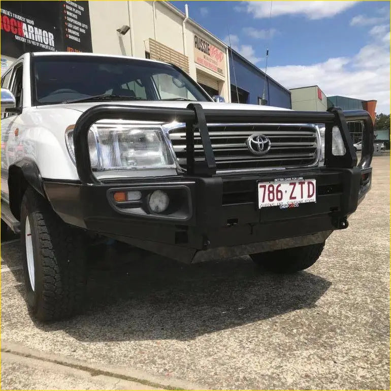 White toyota land cruiser with black steel rockarmor premium bullbar and chrome grille for fj100 ifs model