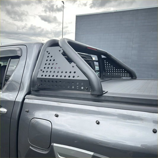 Black perforated metal truck bed rail with curved tubular design shown from back for ford ranger 2022+ roll bar t10