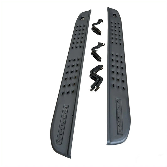 Black plastic side step runners with textured perforated surface and embossed raptor branding for ranger 2022 double cab