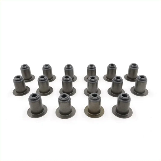 Black rubber valve stem oil seals arranged in a grid for Toyota Hilux Revo 2.4L 2.8L 2015-2023 models