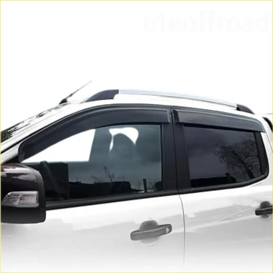 Black plastic window visors installed on a white suv showing the back side for best weathershields for utes nz 2026