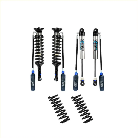 Set of four black and silver x-gear shock absorbers with blue accents and two black coil springs for isuzu d-max lift kit