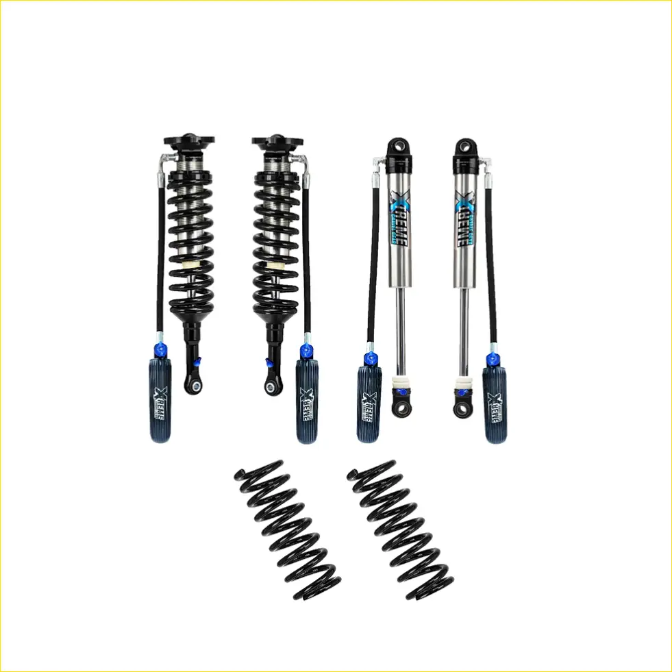 Set of four black and silver x-gear shock absorbers with blue accents and two black coil springs for levelling or lift kits in nz