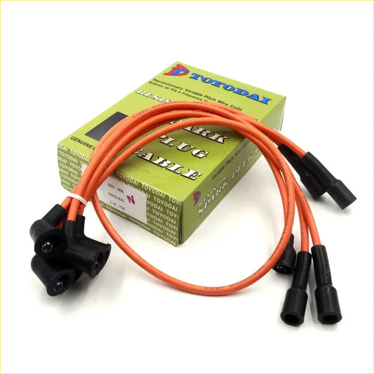 Orange insulated spark plug ignition wires with black connectors in green toyodai box for nissan datsun 521 1968-1972
