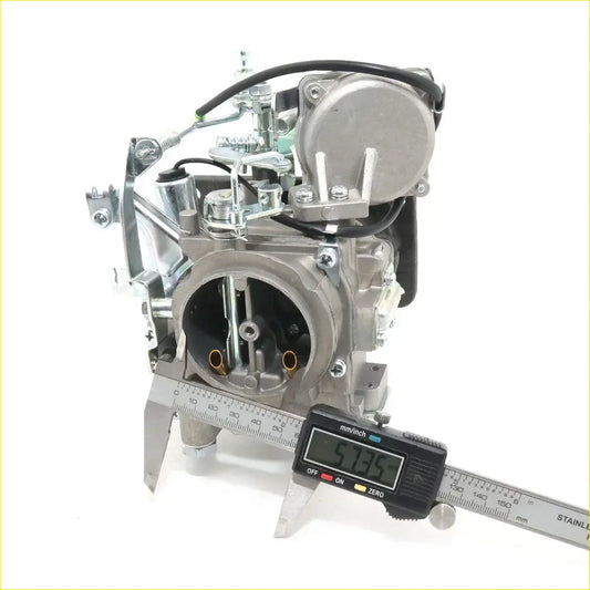 Silver 1.6l carburetor assembly for toyota hilux rn20 rn25 with chrome finish and black hoses measured by caliper