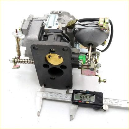 Gray and black 1.6L carburetor assembly with brass accents for Toyota Hilux rn40 1978-1983 measured 58.50 mm wide