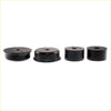 Set of four black rubber mounting bushings with central holes for Nissan Datsun 620 King Cab 1972-1979
