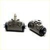 Gray metallic 15/16 rear brake cylinder with black rubber seals and threaded fittings for mitsubishi triton l200 back side