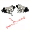 Silver metal rear brake cylinder with black rubber caps and threaded fittings for nissan terrano ii 1993-2006