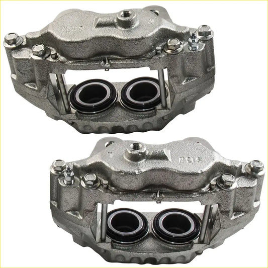 Silver metallic front brake calipers with rugged cast metal finish and two piston openings for toyota 4runner ln130
