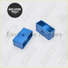 Blue metallic rectangular automotive lift block with central hole and roller for 2 inch rear suspension lift on nissan navara d40
