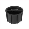 Black plastic cup holder insert with matte finish and vertical ridges for toyota 4runner console box