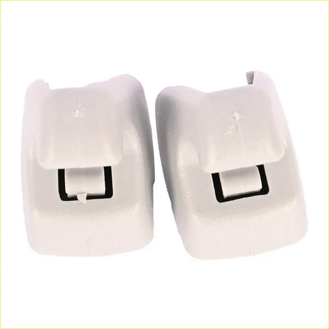 White plastic car door handle covers with black rectangular cutouts for chevy silverado sun visor retainer clips