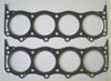 Black rubber engine head gaskets with four metal-ringed openings for land rover range rover discovery mg sd1 tvr