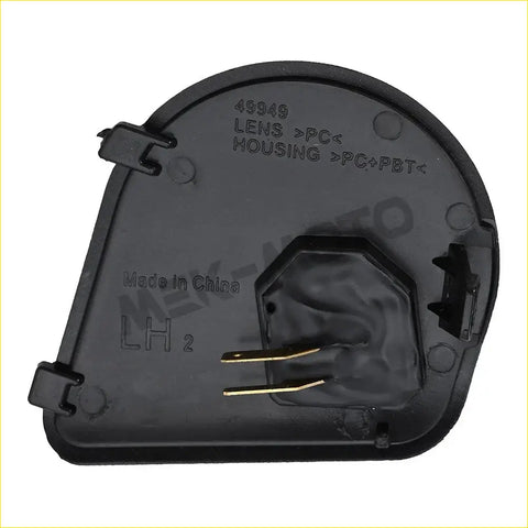 Back of black plastic led side mirror puddle light housing with gold metal contacts for dodge ram 2010–2019