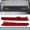 Backside view of red rectangular rear bumper reflector led brake tail lights with textured surface and wiring for toyota rav4