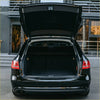 Black audi a6 allroad rear hatch open showing clean cargo area featuring 2 x rear hatch lift supports gas struts