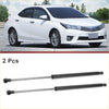 Pair of black and silver gas struts for toyota matrix rear hatch lift supports 2009 to 2013 shown from back side