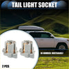 Gray plastic tail light socket adapters with brass contacts shown from the back for toyota 4runner 2003-2009