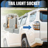Gray plastic tail light socket adapter with copper metal contacts for toyota 4runner 2003-2009 back side view