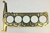 Gold-colored engine head gasket with black sealing rings and cutouts for ranger everest 3.2 tdci 20v cylinder heads