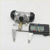 3/4 inch rear brake cylinder for Nissan 720 Navara D21 with silver metal body black rubber caps and brass piston rod measured 38.12 mm