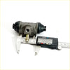 Gray metallic 3/4 rear wheel brake cylinder with black rubber boots and brass fitting for datsun nissan 620 1972-1979