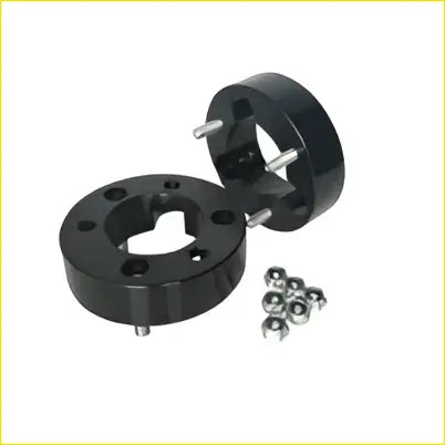 Black rubber wheel hub caps with silver lug nuts shown with 35mm front coil strut shock spacer for nissan navara 4wd