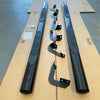 Black stainless steel 4 inch oval tube running board with textured rubber side step rails and mounting brackets for hilux