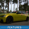 Vibrant lime green bmw sedan with black alloy wheels showcasing sleek body lines and car pillar trim covers for toyota tundra