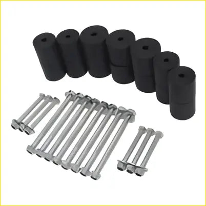 Black rubber cylindrical bushings and silver metal bolts in a 4x4 2 inch body lift kit for nissan navara np300 d23
