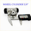 Silver metal 5/8 rear wheel brake cylinder with black rubber caps shown next to digital caliper for nissan navara d21