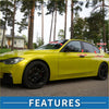 Vibrant yellow bmw sedan with sleek black alloy wheels and tinted windows showcasing carbon 6 pcs door pillar window trim for toyota reiz