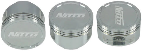 Nitto Forged Pistons - 87.0mm/+0.040in - 15.3cc (RB26 DETT) — fits Nissan Skyline R32