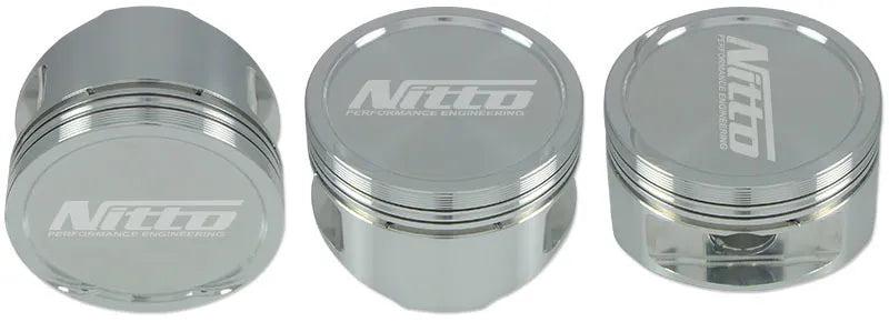 Nitto Forged Pistons - 87.0mm/+0.040in - 15.3cc (RB26 DETT) — fits Nissan Skyline R32